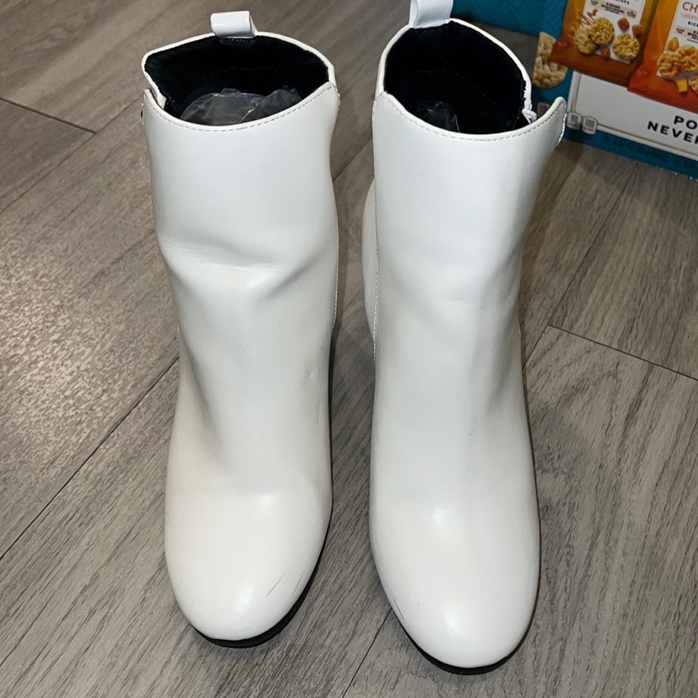 White boots, size 7 worn a few times, minor damage